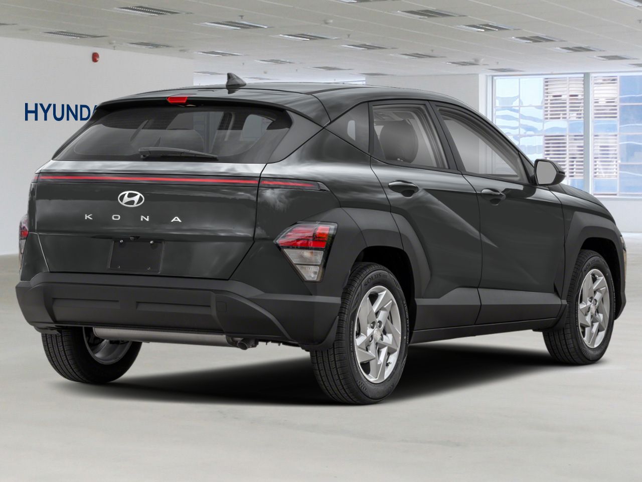 Vue avant du Hyundai Kona 2026 Essential TI gris écotronique