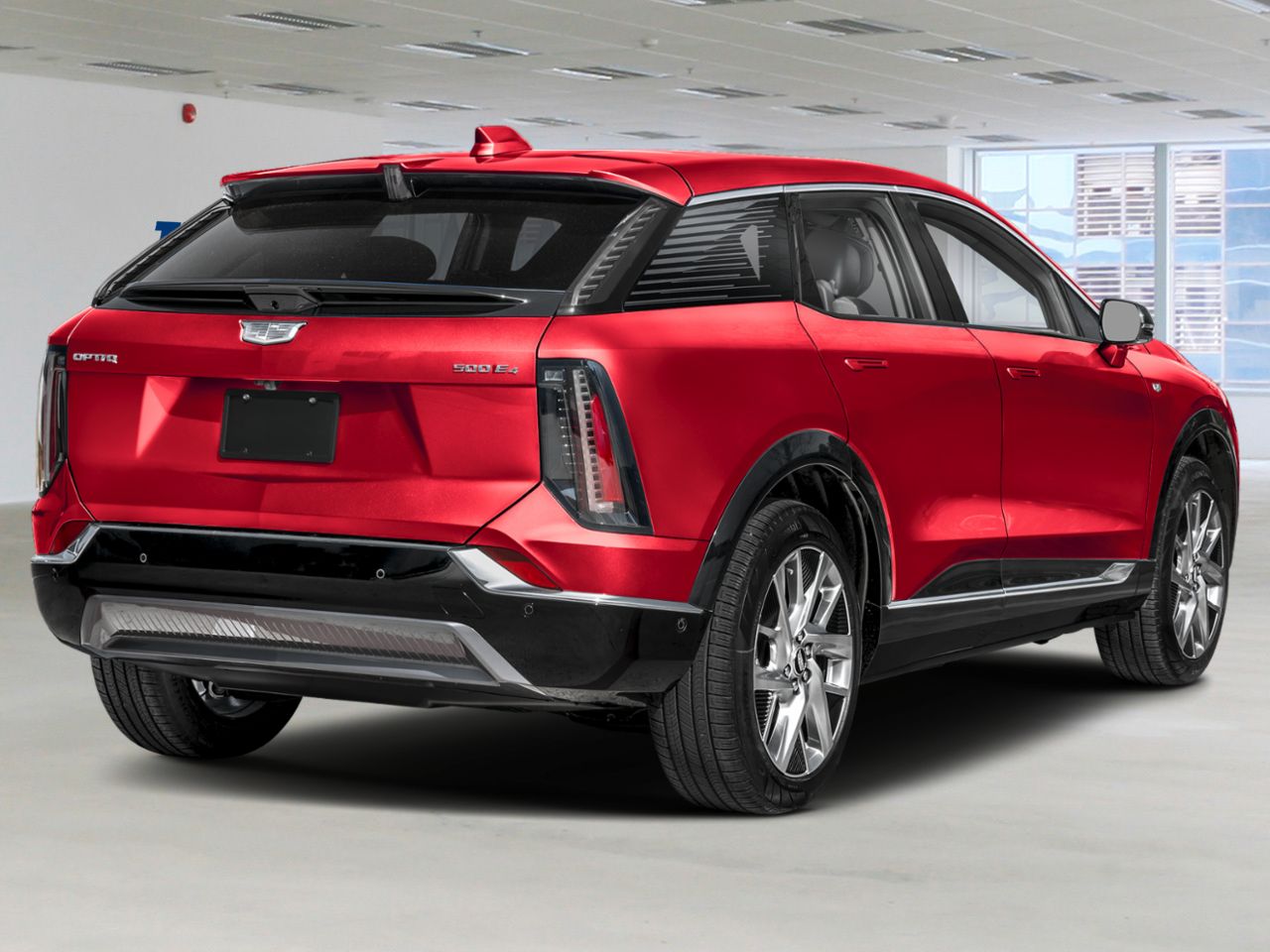 CADILLAC OPTIQ Sport haut de gamme 4 portes 2026 Teinte rouge &eacute;clatant Sherbrooke - photo #1